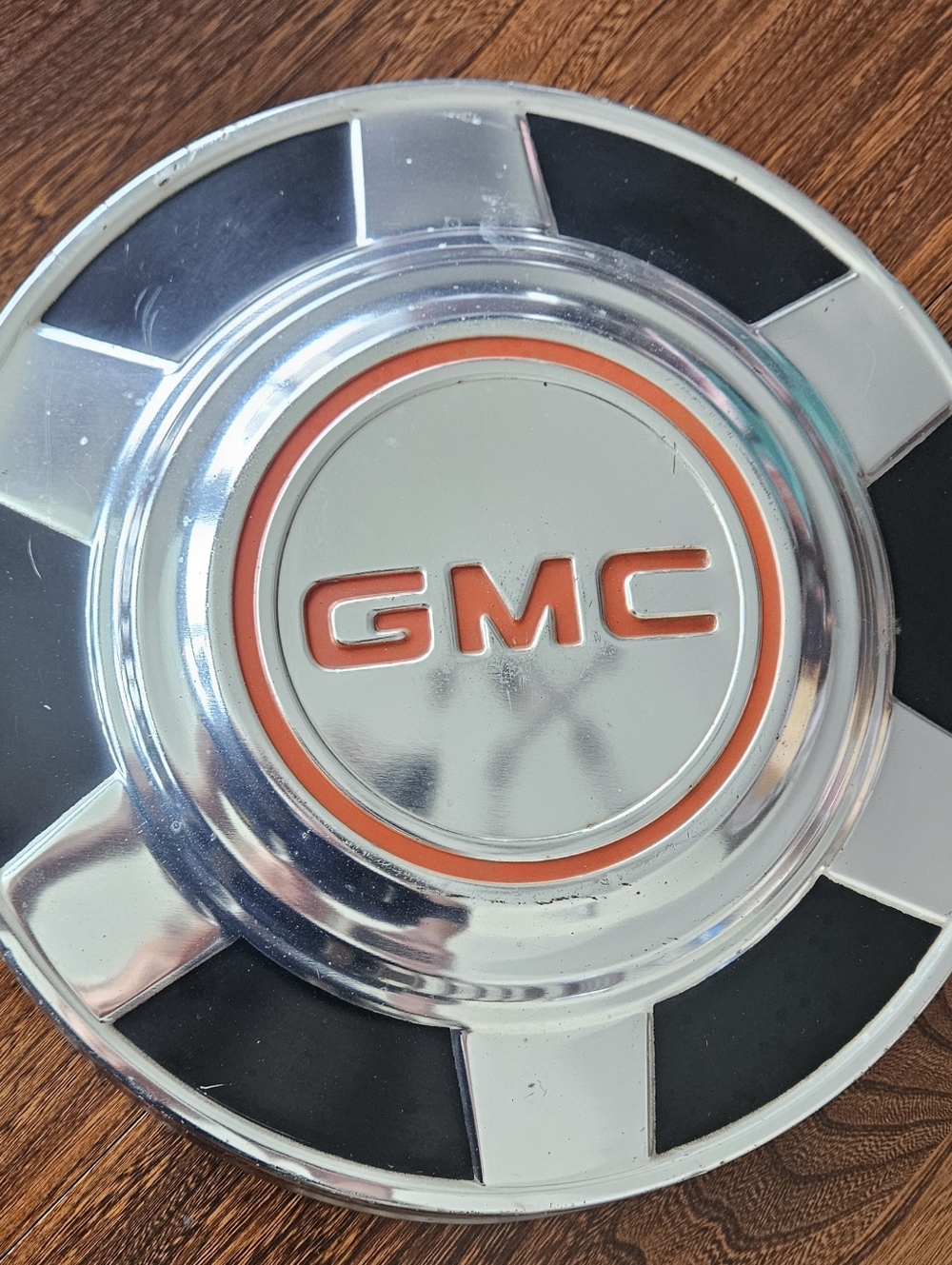 One 1973/1987 GMC Pick Up Truck 1/2 Ton Dog Dish Hubcap.  Measures 12".